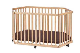 Wooden playpen with a brown mat and wheels on the bottom for easy movement.