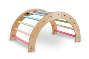 Wooden climbing arch with colorful bars on a gray background. Kletterbogen.