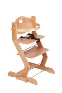 Wooden high chair with adjustable seat, footrest, and safety strap.